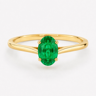 0.50 carat oval-cut laboratory-created emerald solitaire ring in 14K yellow gold