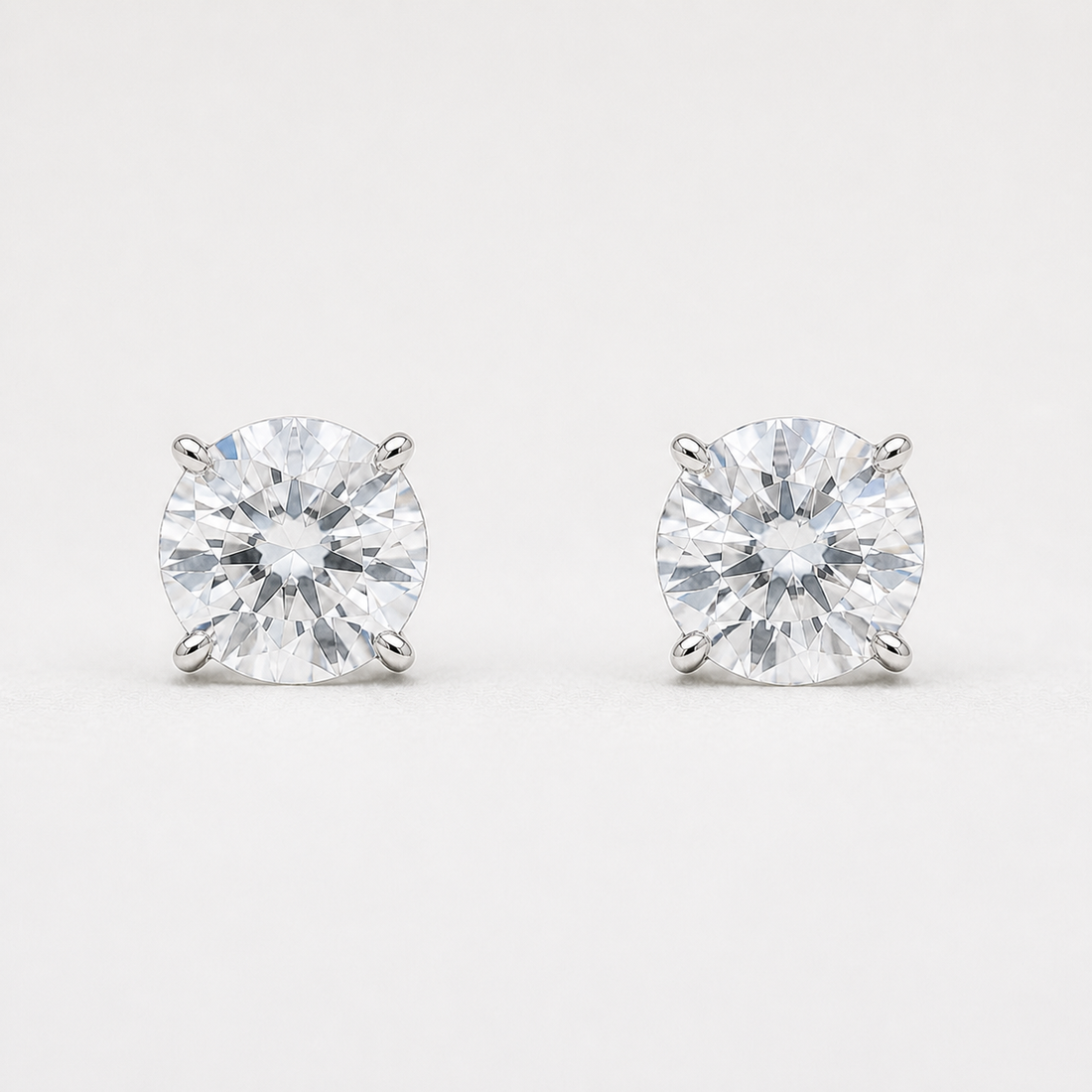 0.90 CTW lab-grown diamond stud earrings in 14K white gold