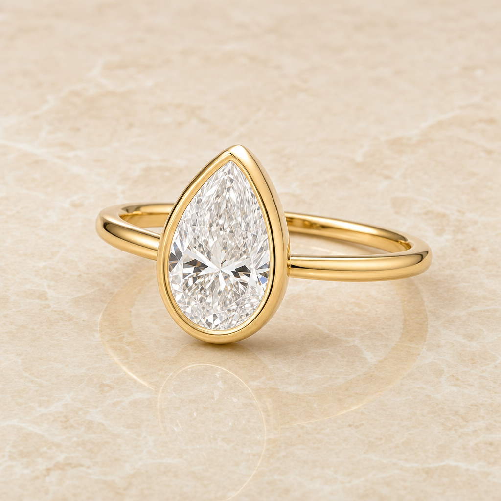 Pear bezel-set diamond engagement ring setting – 1Luxury Miami