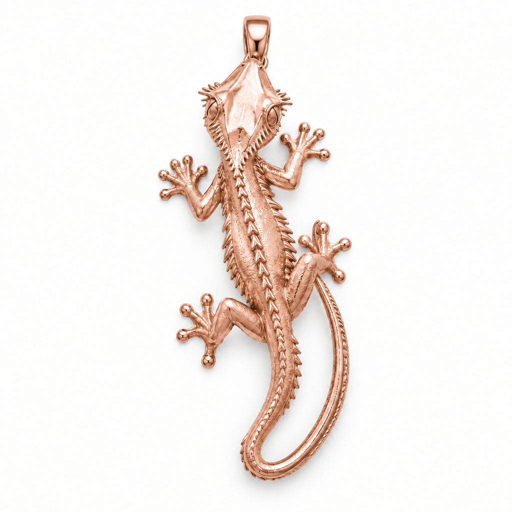 Crested gecko pendant design render in high-polish rose gold on white; pendant only.
