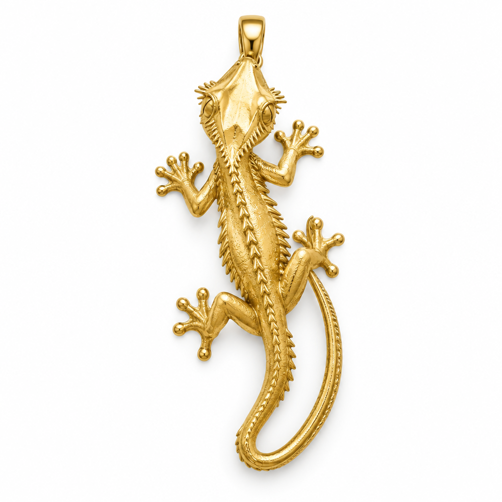 Crested gecko pendant design render in high-polish yellow gold on white; pendant only.