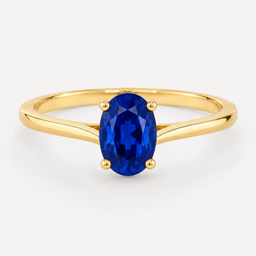 0.50 carat oval-cut laboratory-created blue sapphire solitaire ring in 14K yellow gold