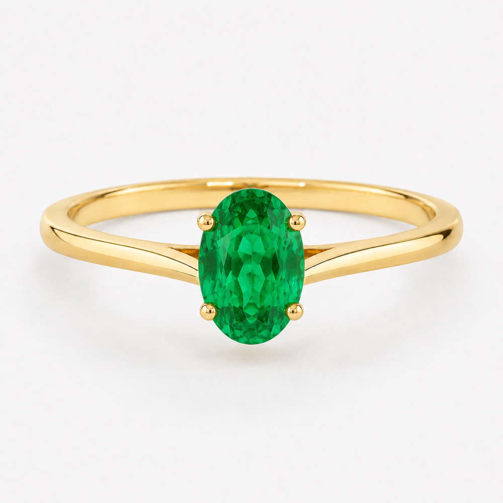 0.50 carat oval-cut laboratory-created emerald solitaire ring in 14K yellow gold