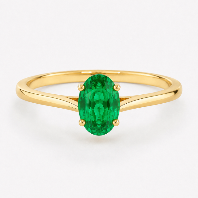 0.50 carat oval-cut laboratory-created emerald solitaire ring in 14K yellow gold