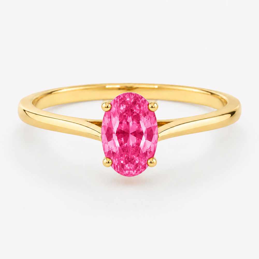 0.50 carat oval-cut laboratory-created pink sapphire solitaire ring in 14K yellow gold