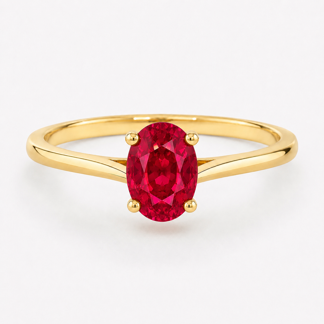 0.50 carat oval-cut laboratory-created ruby solitaire ring in 14K yellow gold