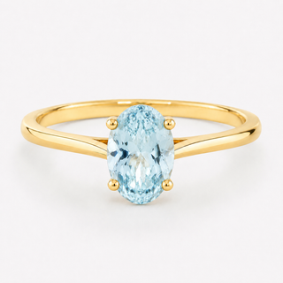 0.50 carat oval-cut natural aquamarine solitaire ring in 14K yellow gold