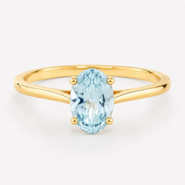 0.50 carat oval-cut natural aquamarine solitaire ring in 14K yellow gold