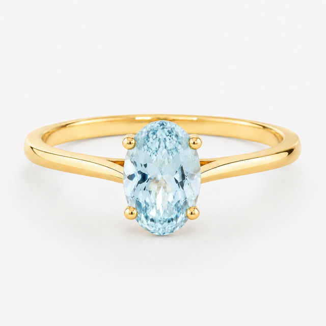 0.50 carat oval-cut natural aquamarine solitaire ring in 14K yellow gold