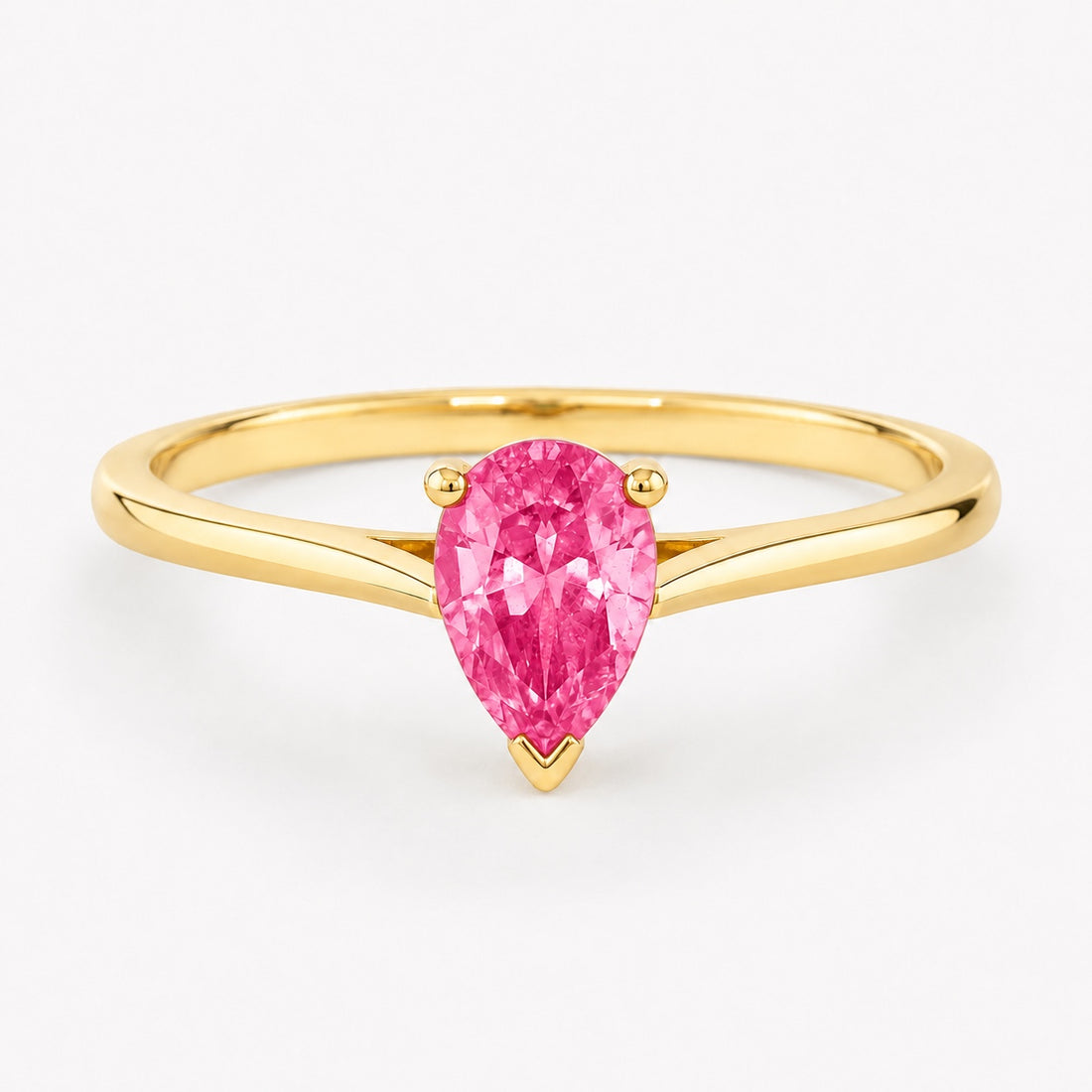 0.50 carat pear-cut laboratory-created pink sapphire solitaire ring in 14K yellow gold