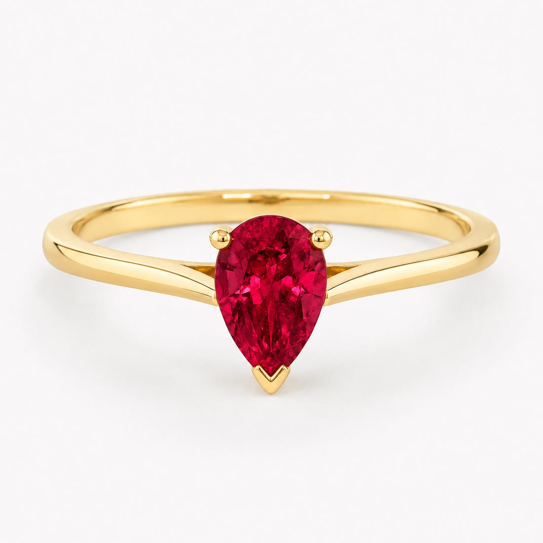 0.50 carat pear-cut laboratory-created ruby solitaire ring in 14K yellow gold