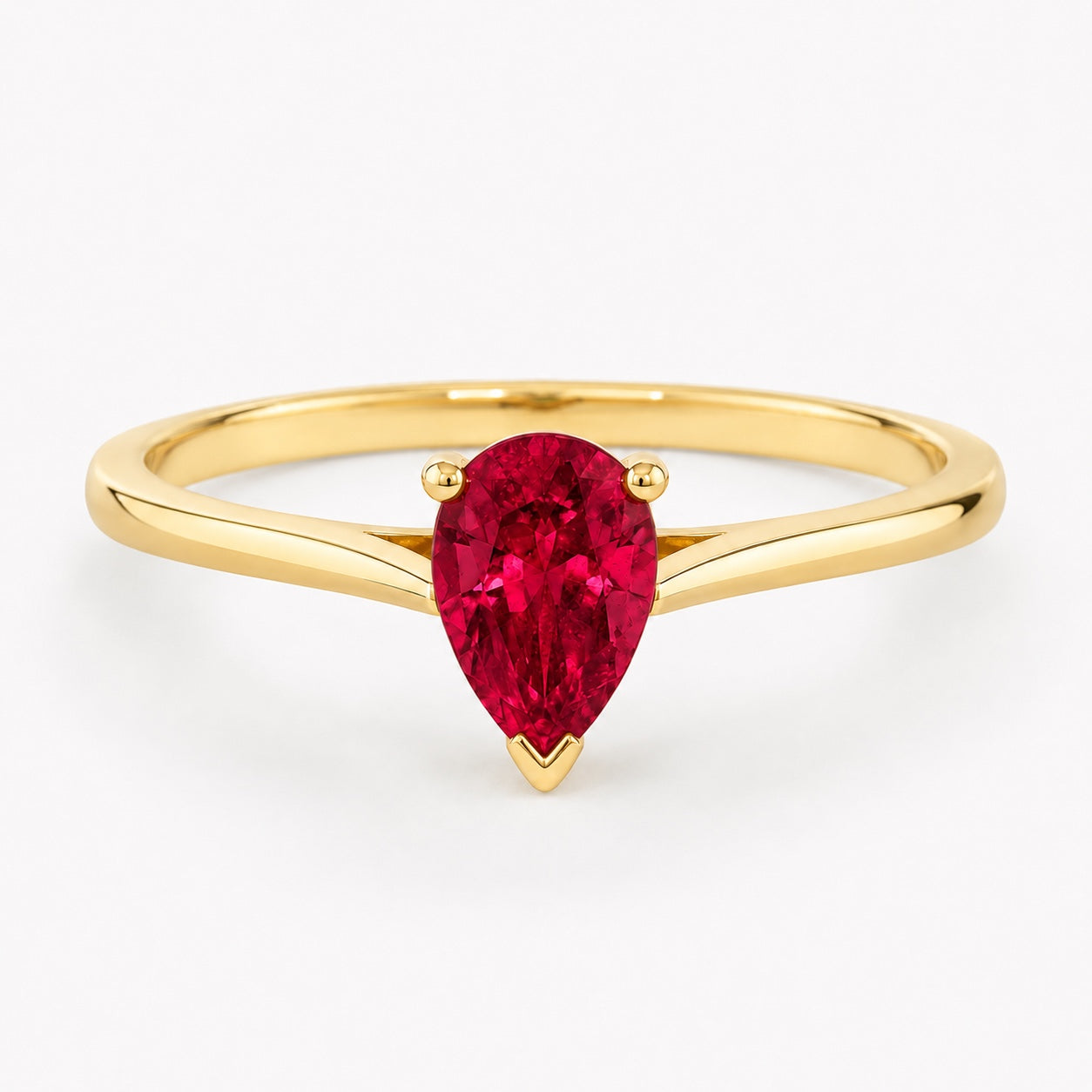 0.50 carat pear-cut laboratory-created ruby solitaire ring in 14K yellow gold