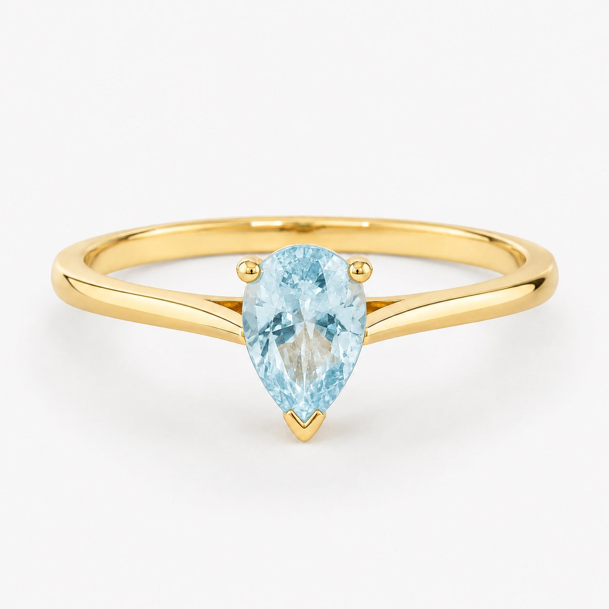 0.50 carat pear-cut natural aquamarine solitaire ring in 14K yellow gold