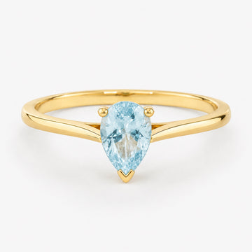 0.50 carat pear-cut natural aquamarine solitaire ring in 14K yellow gold