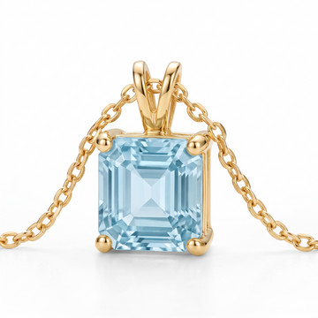 Asscher-Cut Aquamarine Solitaire Necklace in Solid Gold macro gemstone and setting view on white background
