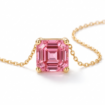 Asscher-Cut Pink Tourmaline Solitaire Necklace in Solid Gold macro gemstone and setting view on white background
