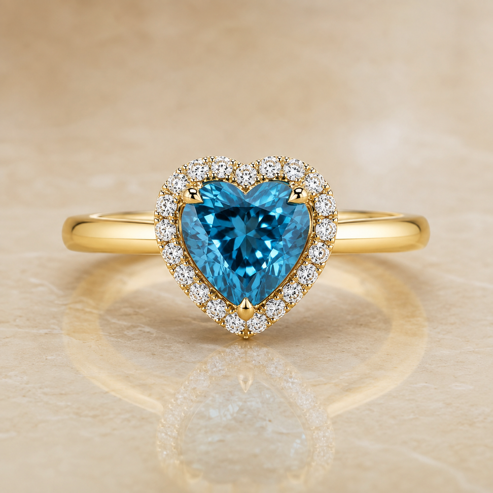Blue heart-shaped lab-grown diamond halo engagement ring in 14K yellow gold