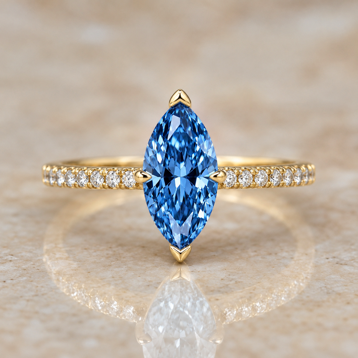 Blue marquise lab-grown diamond pavé engagement ring in 14K yellow gold