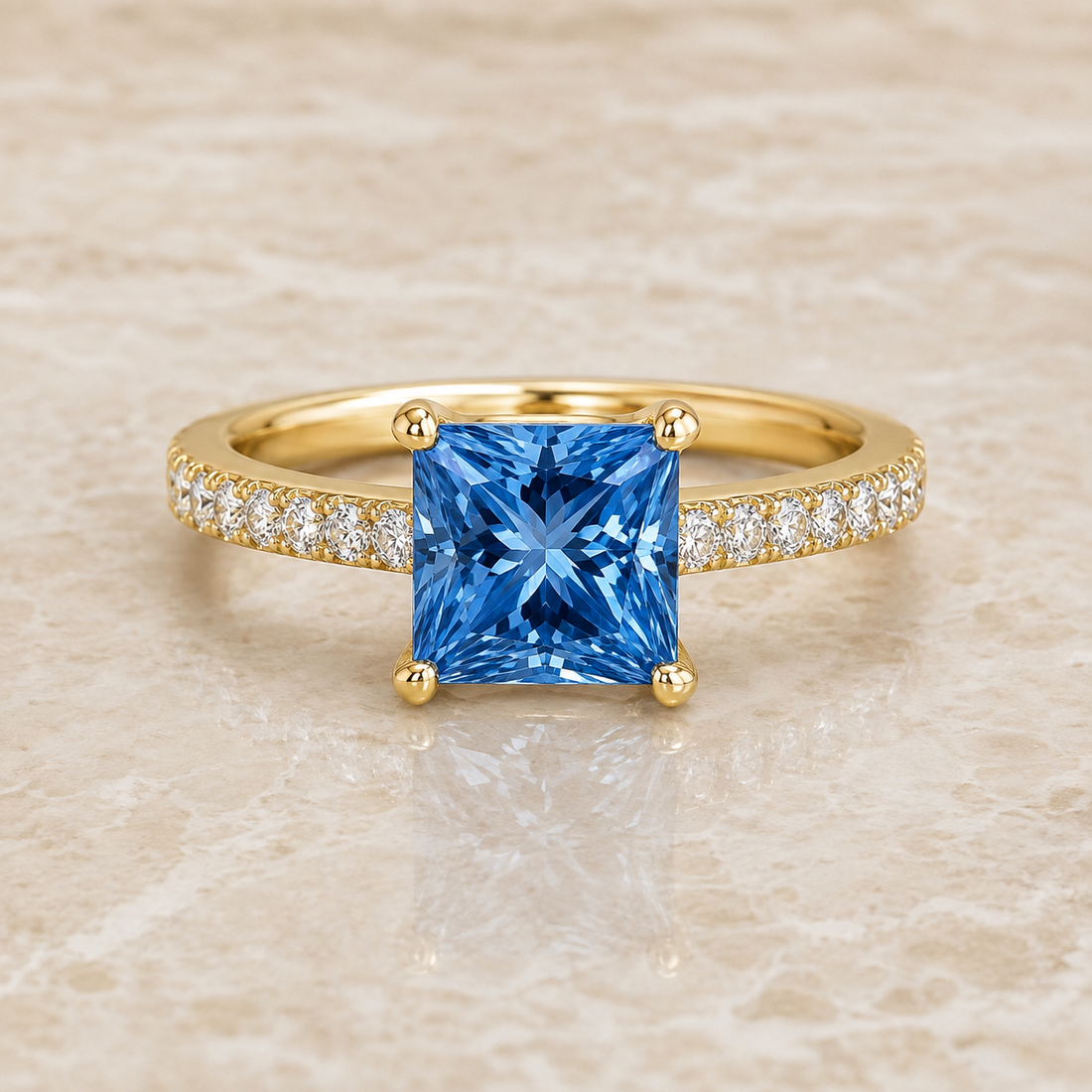 Blue princess-cut lab-grown diamond channel-set engagement ring in 14K yellow gold