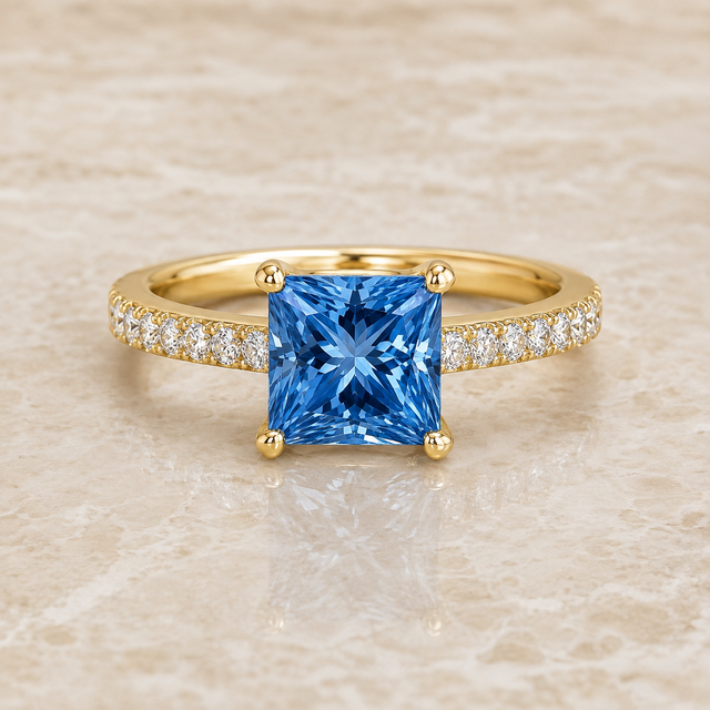 Blue princess-cut lab-grown diamond channel-set engagement ring in 14K yellow gold