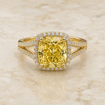 Canary cushion yellow lab-grown diamond split-shank halo engagement ring in yellow gold