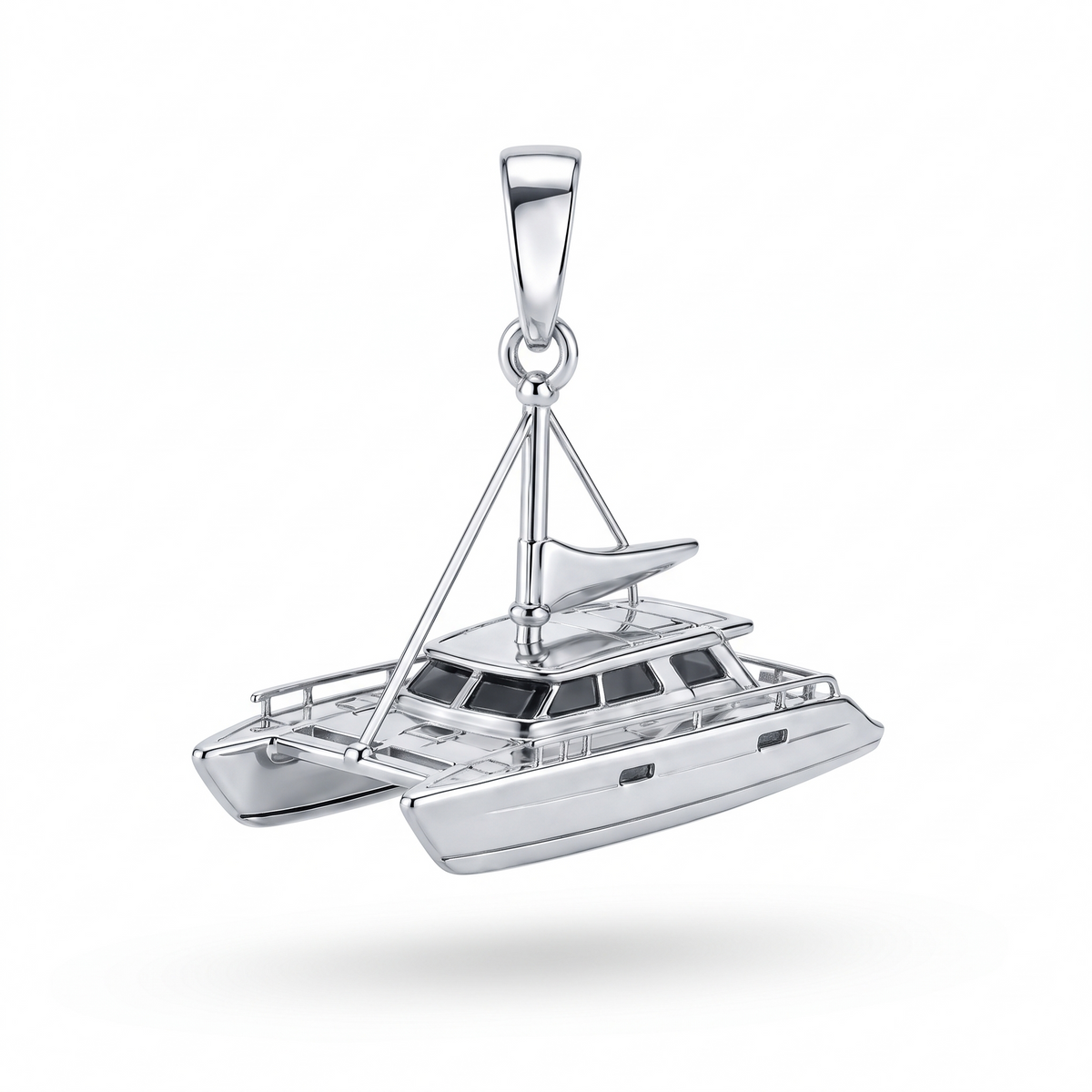 Solid Gold Catamaran Pendant shown in white-gold color variation on white background