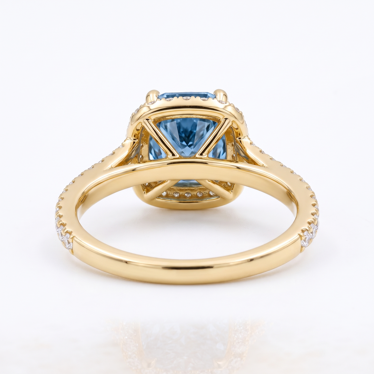 Blue Cushion-Cut Lab-Grown Diamond Split-Shank Halo Engagement Ring side and rear construction view on white background