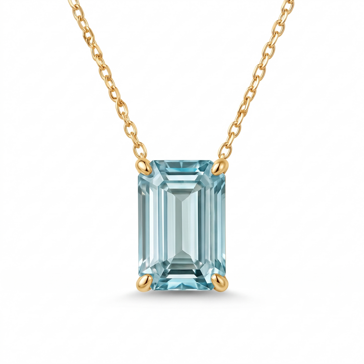 Emerald-cut aquamarine solitaire necklace in solid gold, catalog view — AI-generated design representation