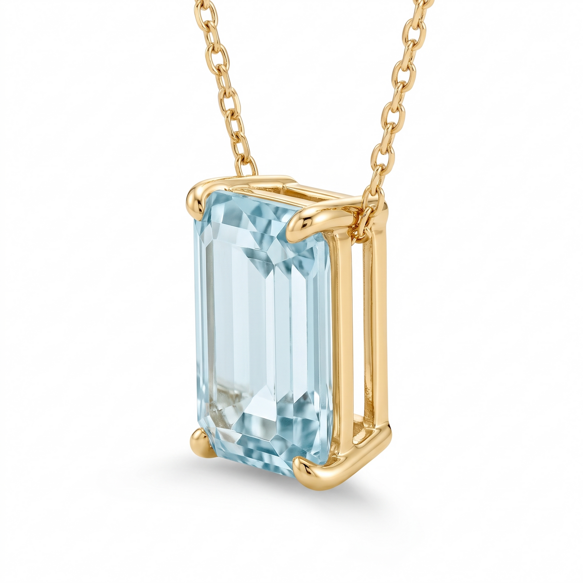 Emerald-cut aquamarine solitaire necklace, angled setting view — AI-generated design representation