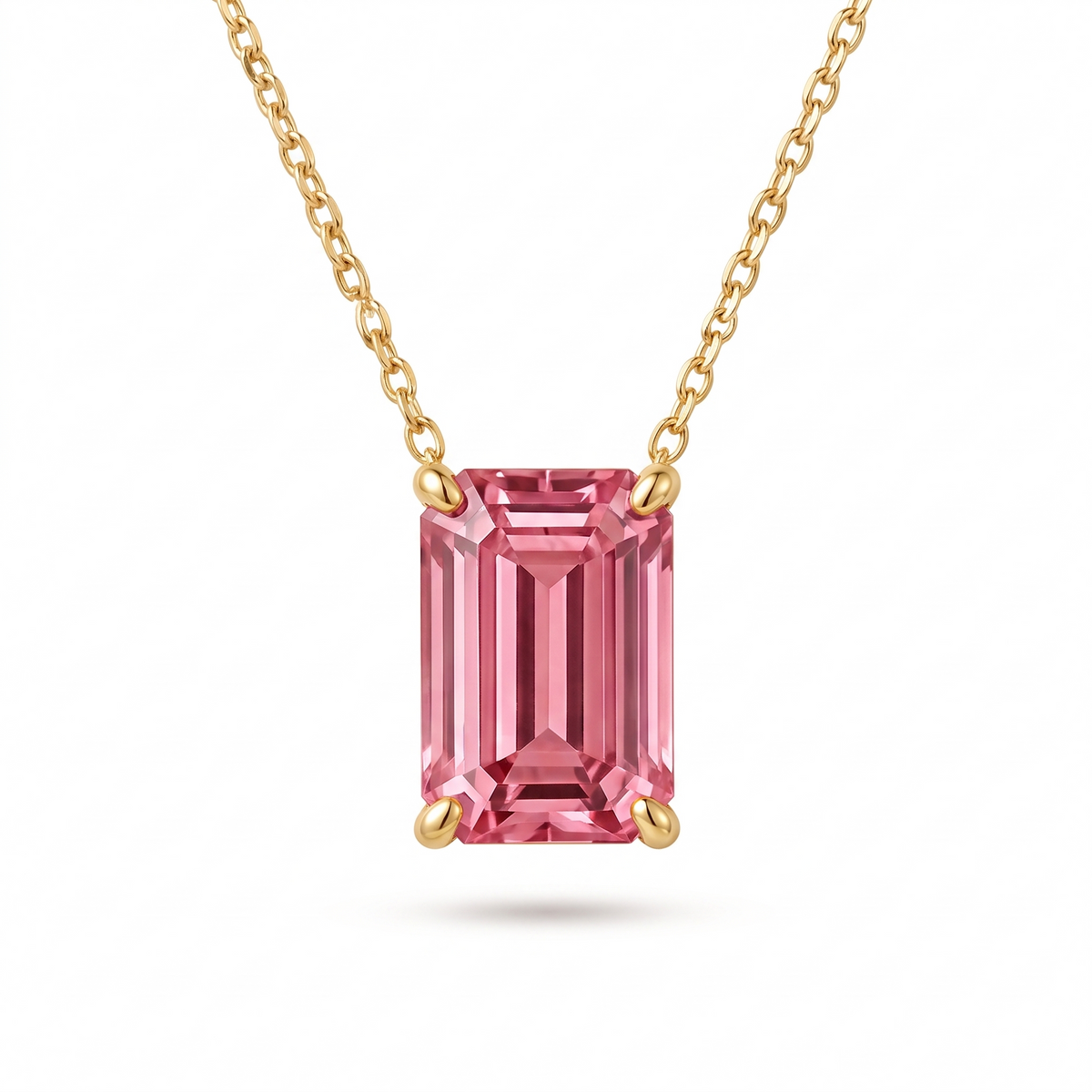 Emerald-cut pink tourmaline solitaire necklace in solid gold, catalog view — AI-generated design representation