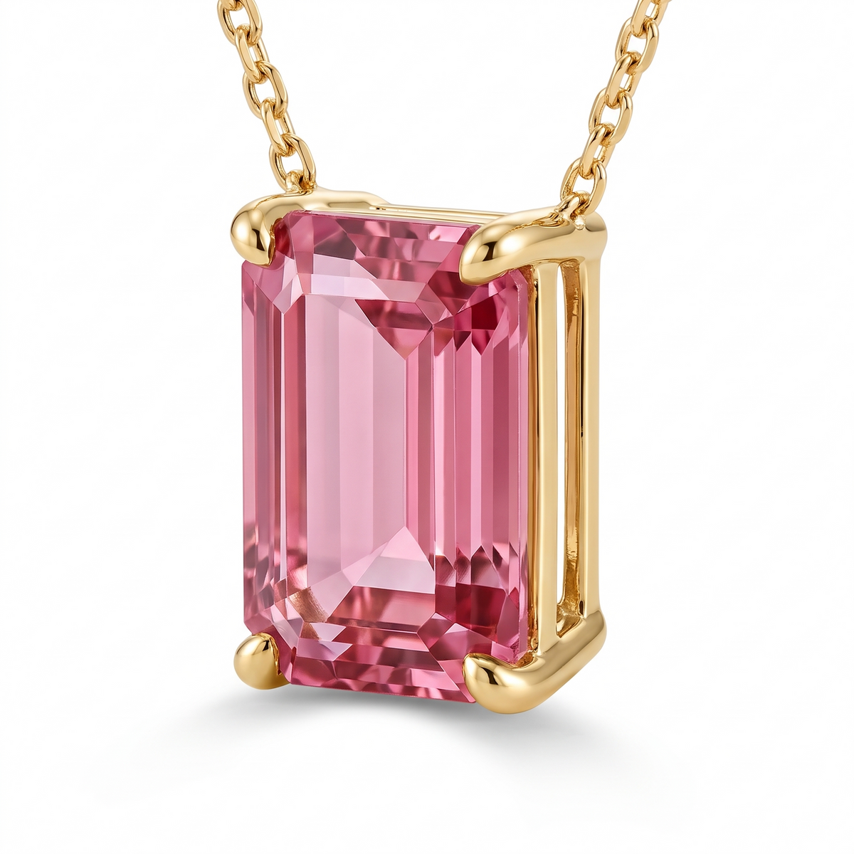 Emerald-cut pink tourmaline solitaire necklace, angled setting view — AI-generated design representation