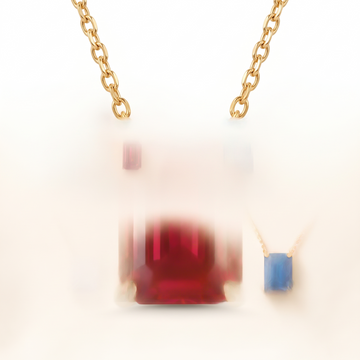 Emerald-cut ruby solitaire necklace, gemstone and setting detail — AI-generated design representation