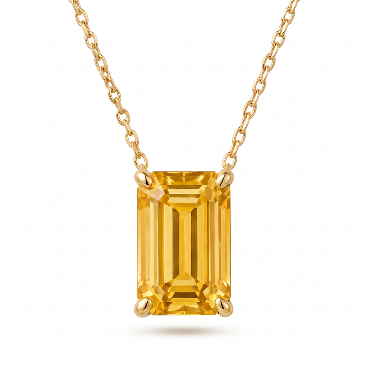 Emerald-cut yellow sapphire solitaire necklace in solid gold, catalog view — AI-generated design representation
