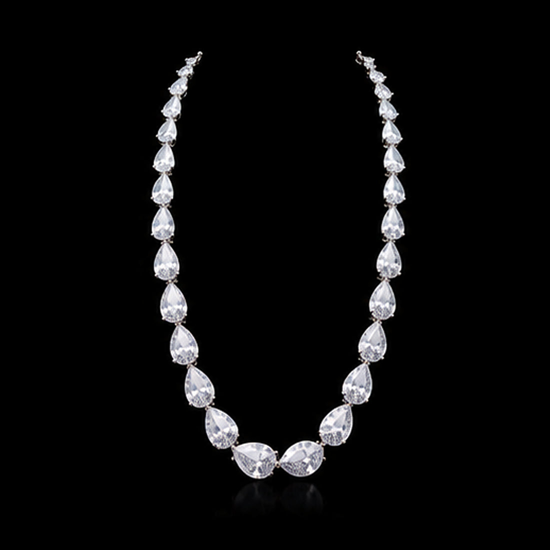 1Luxury graduated pear-cut diamond tennis necklace design render on a black background