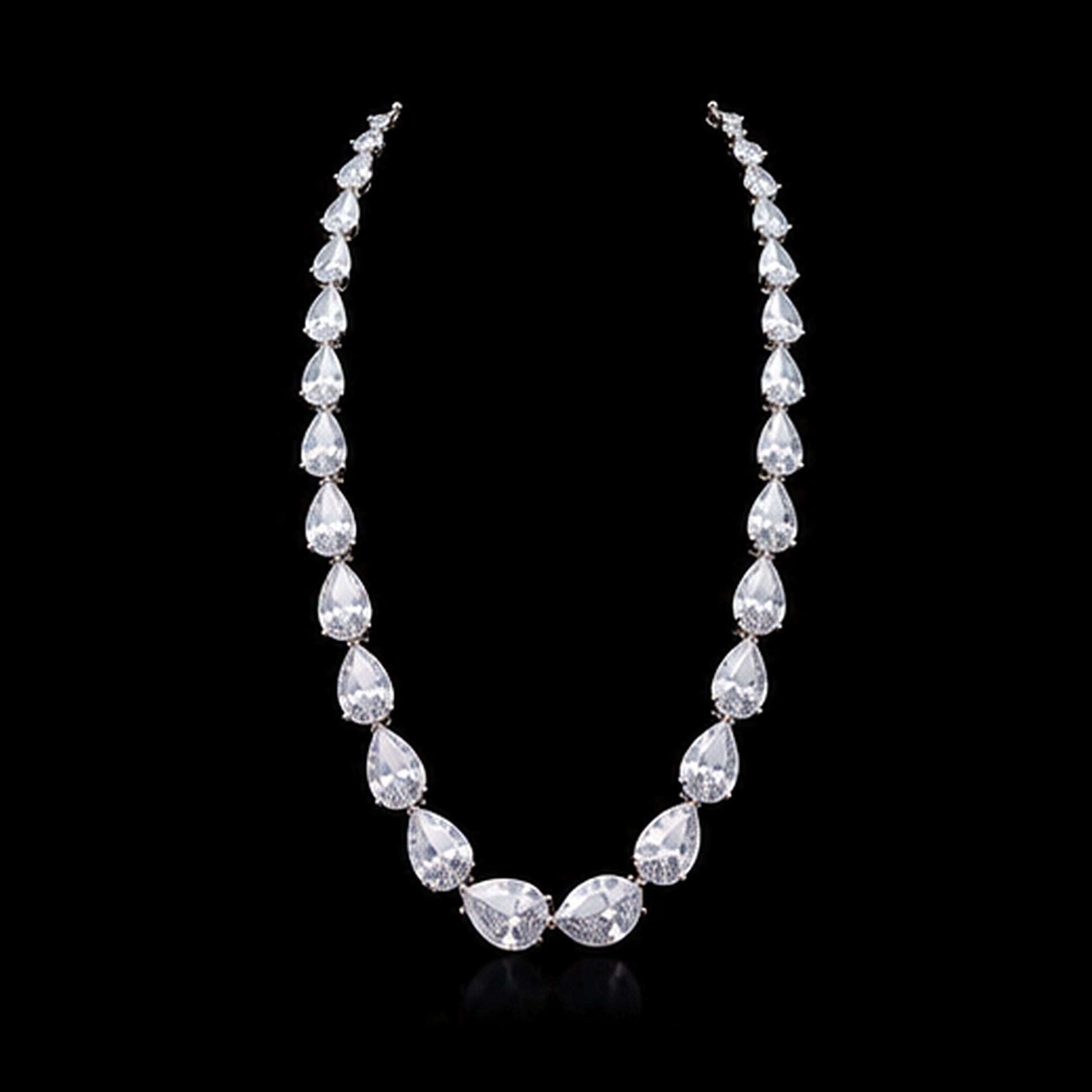 1Luxury graduated pear-cut diamond tennis necklace design render on a black background