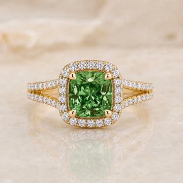 Green cushion lab-grown diamond split-shank halo engagement ring in 14K yellow gold