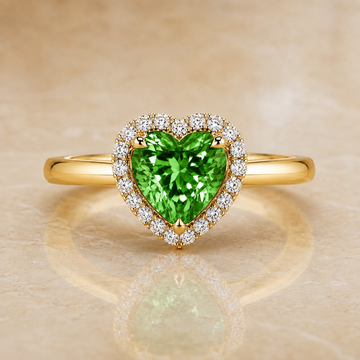 Green heart-shaped lab-grown diamond halo engagement ring in 14K yellow gold