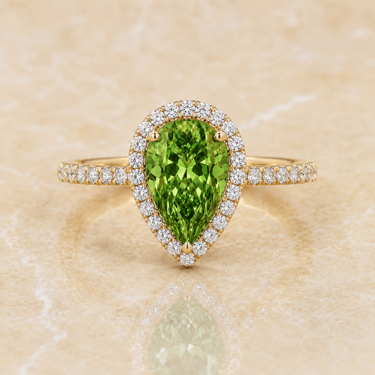 Green pear-shaped lab-grown diamond halo engagement ring in 14K yellow gold