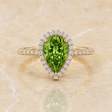 Green pear-shaped lab-grown diamond halo engagement ring in 14K yellow gold