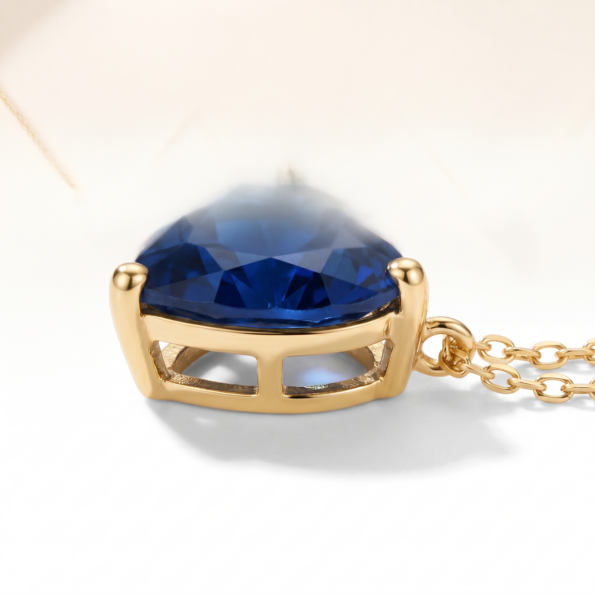 Heart-Cut Blue Sapphire Solitaire Necklace three-quarter setting profile