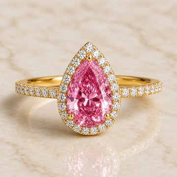 Lumière pear pink lab-grown diamond halo engagement ring in yellow gold