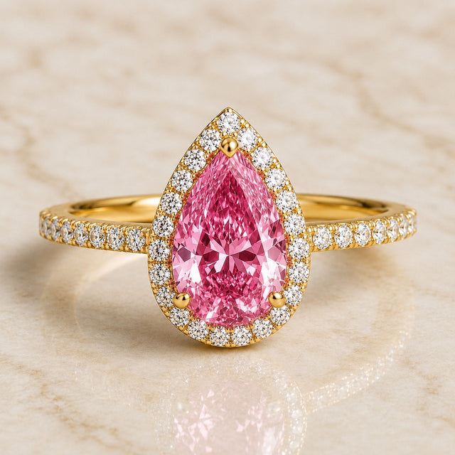 Lumière pear pink lab-grown diamond halo engagement ring in yellow gold