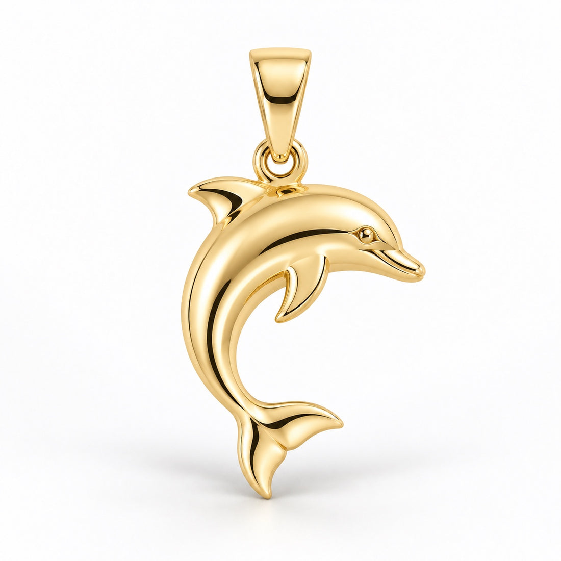 Yellow-gold dolphin pendant design rendering with a leaping curved body, sculpted fins and shaped tail on white.