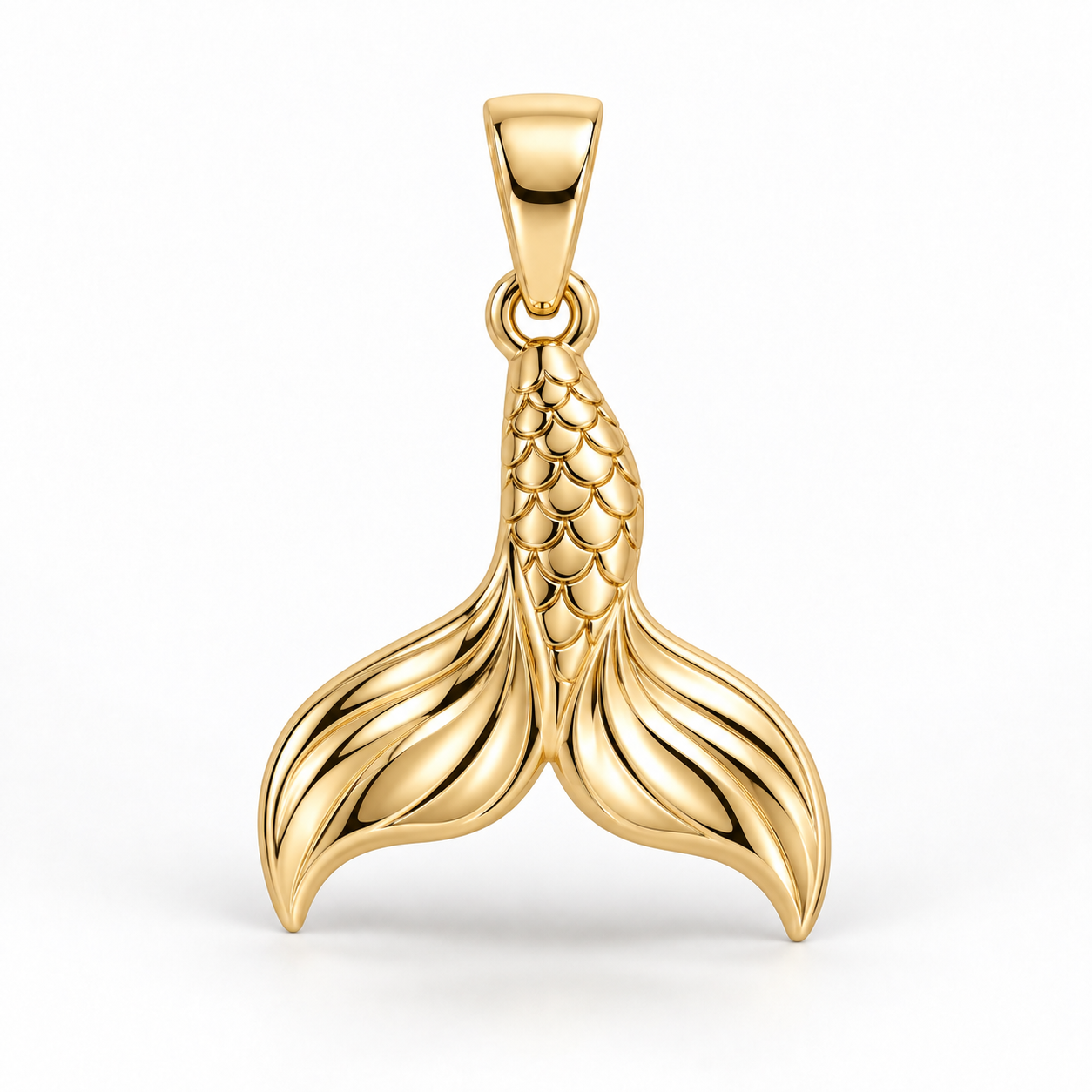 Yellow-gold mermaid tail pendant design rendering with overlapping scales and flowing ridges across the split fin.