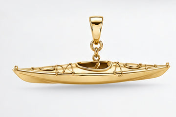 Yellow-gold touring kayak pendant with pointed hull, recessed cockpit, deck hatches and bail, side view. AI-generated design rendering; pendant only.