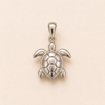 Mini Turtle pendant — reused white-gold design rendering for the silver counterpart.