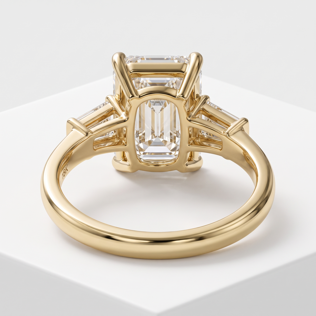 Model 05 Emerald Baguette Classic engagement ring rear three-quarter catalog view on white background