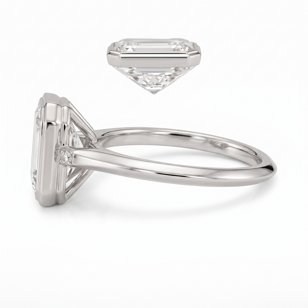 Model 16 Emerald Bezel Minimal engagement ring side profile catalog view on white background