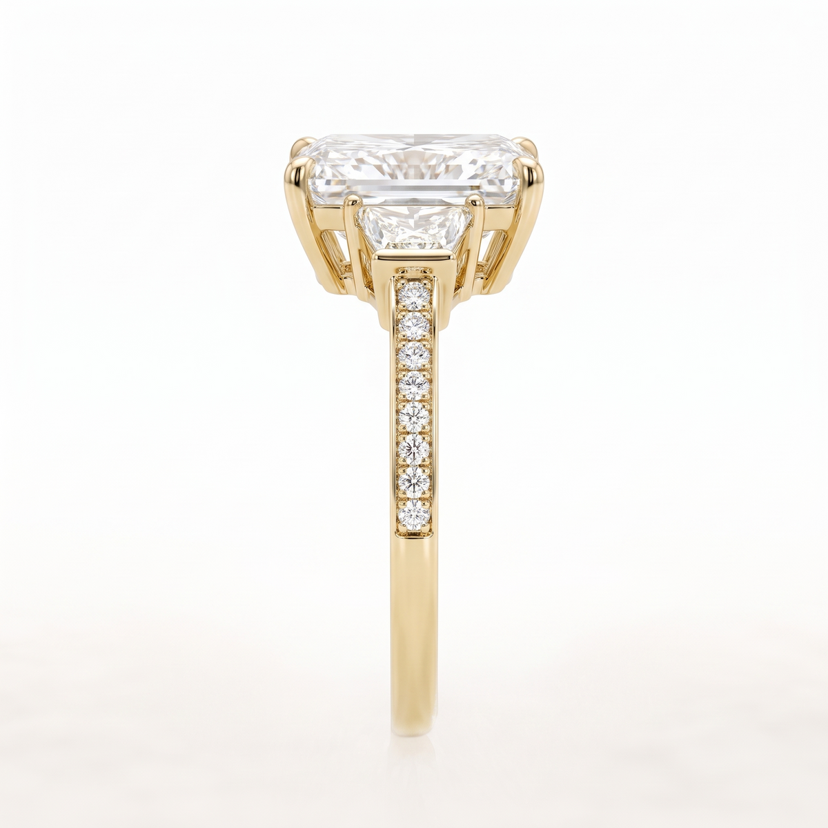 Model 17 Radiant Three-Stone engagement ring side profile catalog view on white background