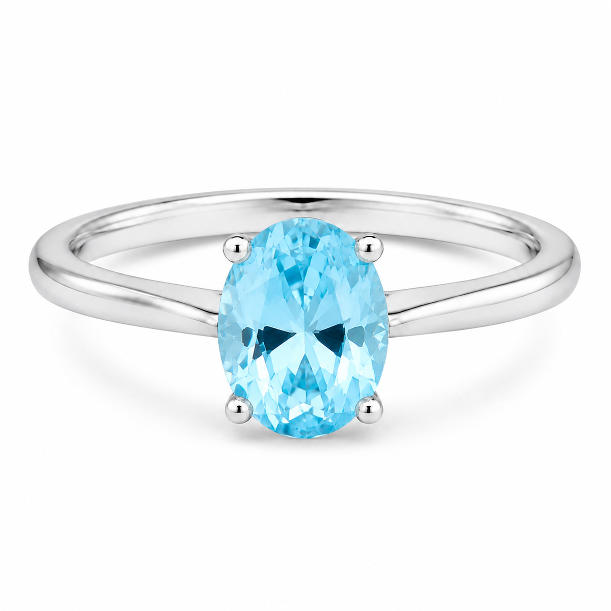 Oval simulated blue topaz solitaire ring in polished 925 sterling silver